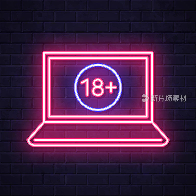 笔记本电脑有18个加号(18+)。在砖墙背景上发光的霓虹灯图标