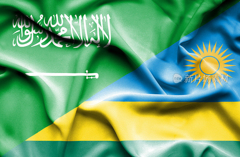挥舞着卢旺达和沙特阿拉伯的旗帜