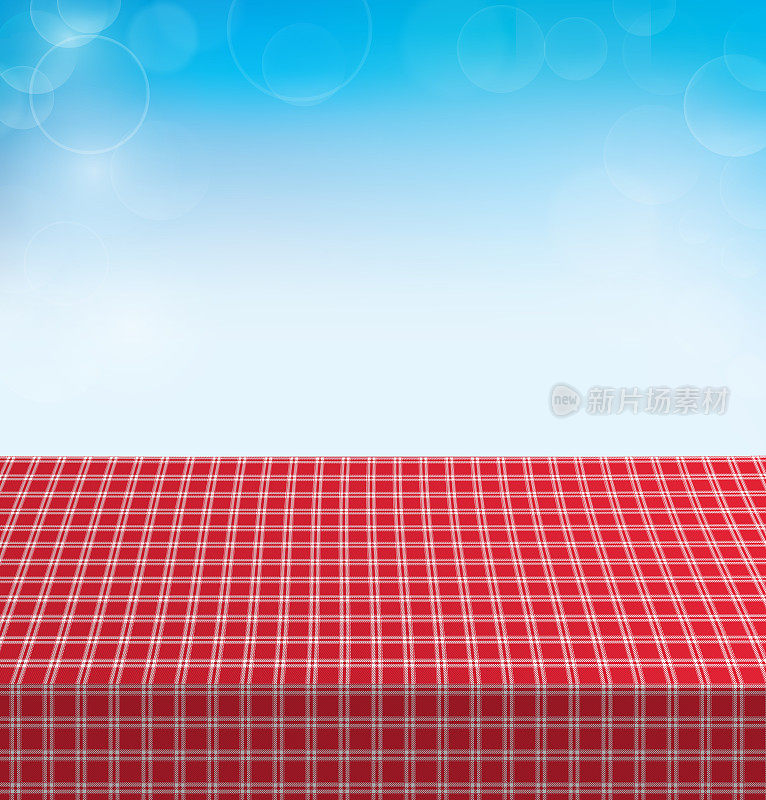 铺有格子桌布的野餐桌。矢量图