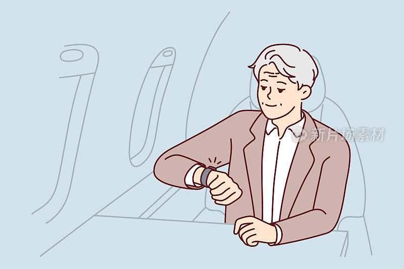 成熟的富人坐在飞机上看钟