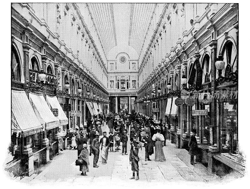19世纪，人们在比利时布鲁塞尔圣休伯特皇家画廊的国王画廊购物