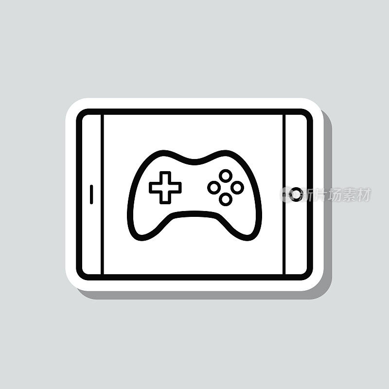 平板电脑视频游戏。图标贴纸在灰色背景