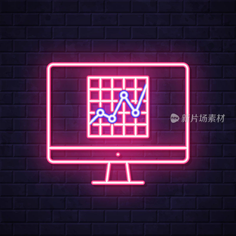 带有图形的台式计算机。在砖墙背景上发光的霓虹灯图标