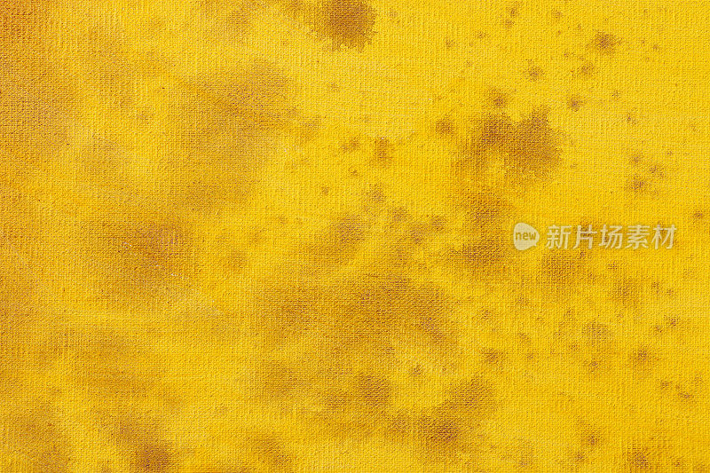 黄色抽象艺术背景。画布上的丙烯酸染料。温暖的颜色。柔和的油漆笔触。
