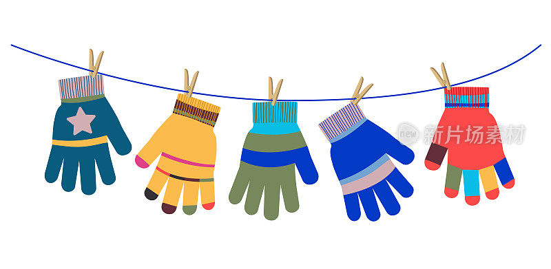 五颜六色的手套挂在晾衣绳上