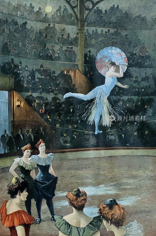撑着阳伞的女艺人在钢索上跳舞