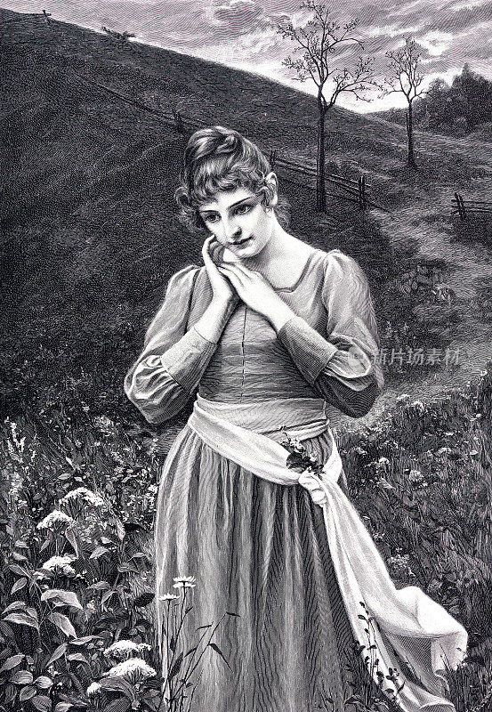 初恋:年轻的美女在公园散步,思考着,手放在脸颊上,头发竖起来