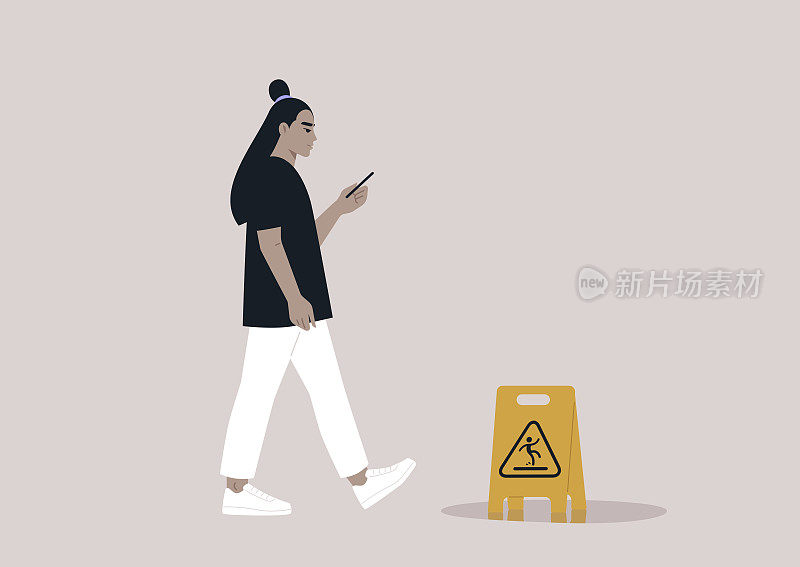 年轻的亚洲人被他们的智能手机分心，忽视了路上的黄色湿地板警告标志