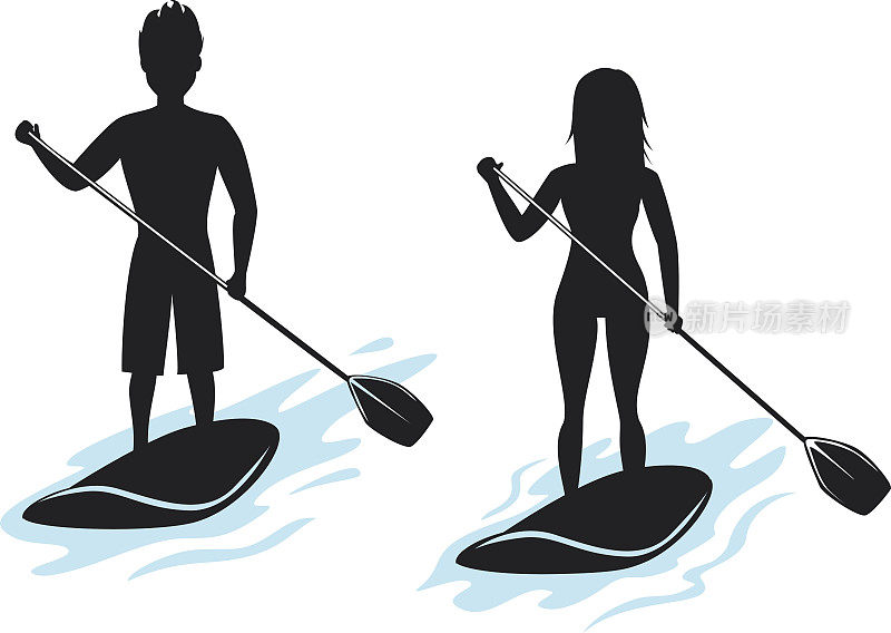 男人和女人站起来划桨，桨板剪影