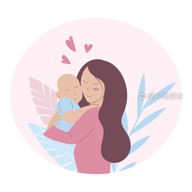 一个年轻快乐的女人怀里抱着一个婴儿