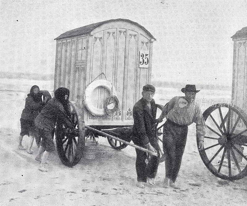 诺德尼，海滩上有大轮子的木制浴车