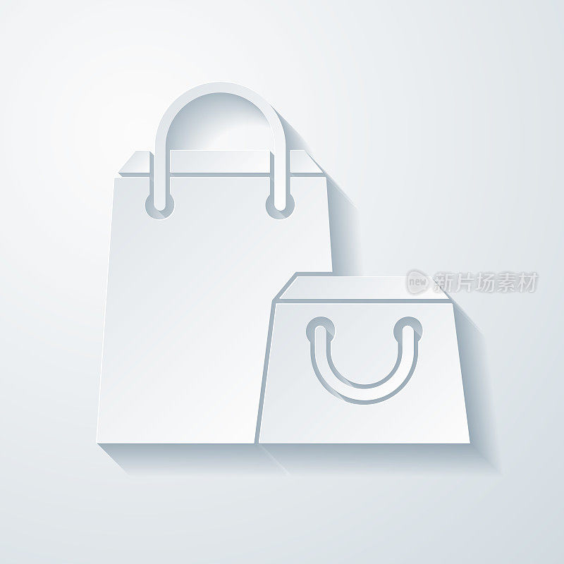 购物袋。空白背景上剪纸效果的图标