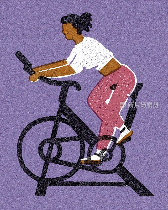骑健身自行车的女人
