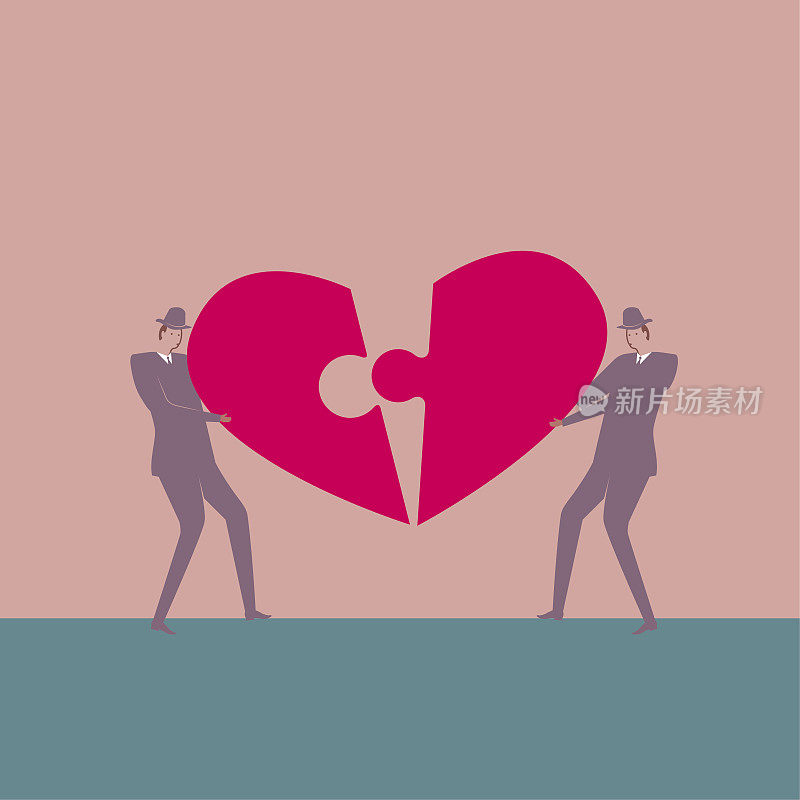 团队概念设计,两人举起一个心形的拼图符号。