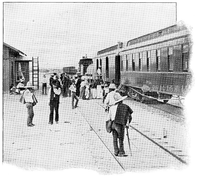 19世纪，在墨西哥火车站上火车的人