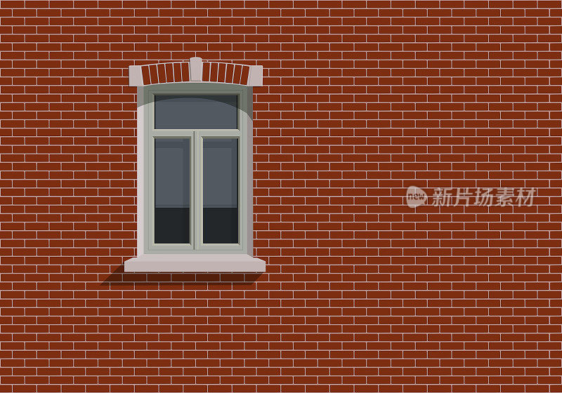 砖墙上有窗户的建筑立面。