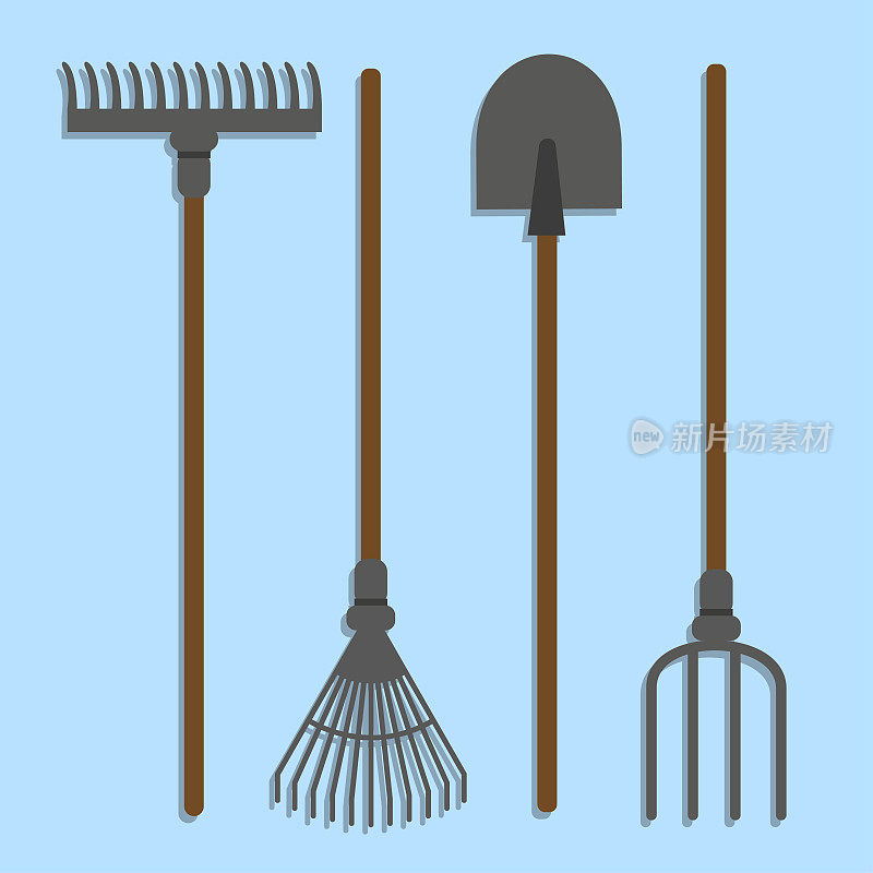 花园工具集。耙子，干草叉，耙子，铲子。