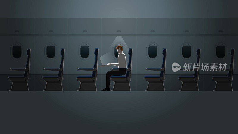 在飞机客舱里，一个人在昏暗的小灯光下用笔记本电脑工作。出差、加班、过度工作的生活方式。飞机内部有一个空座位。