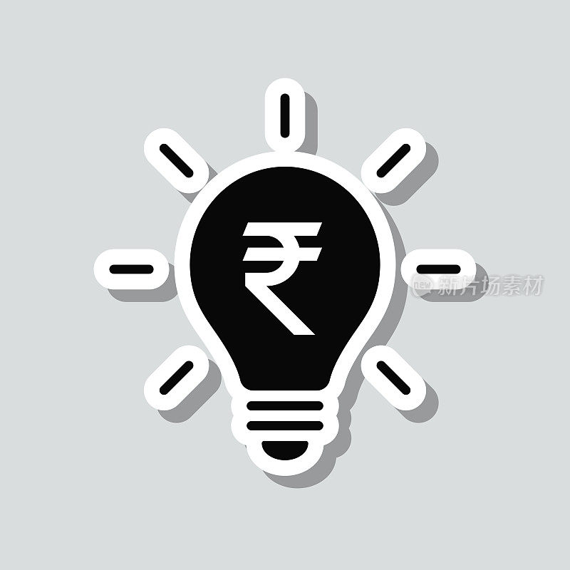 印有印度卢比标志的灯泡。图标贴纸在灰色背景