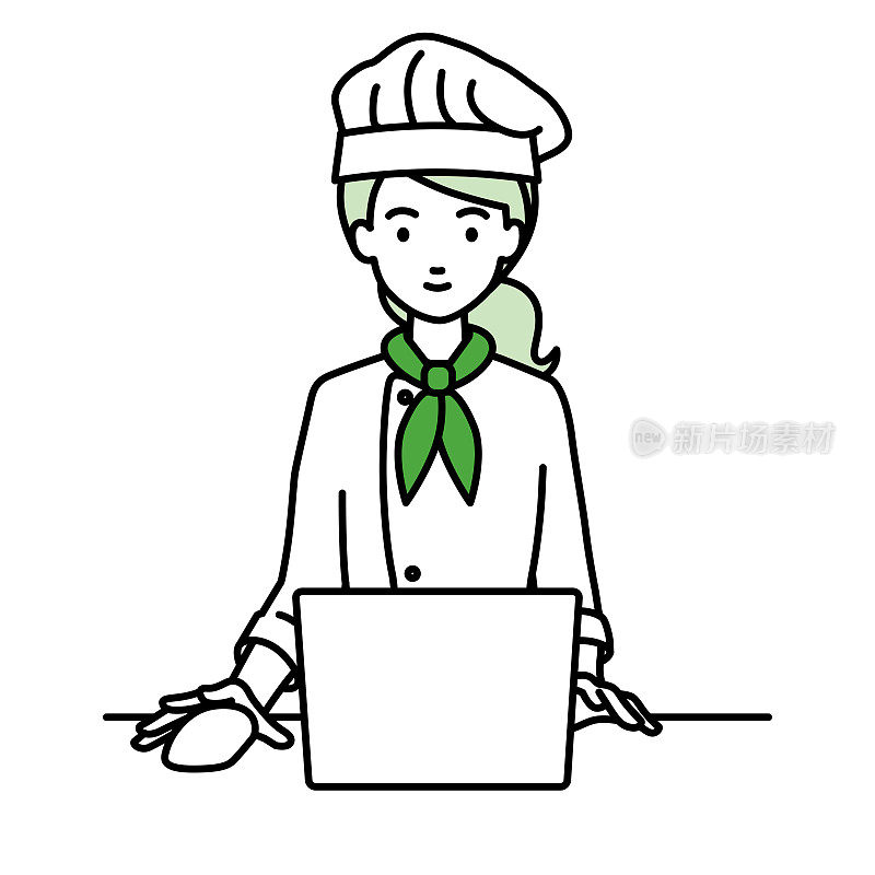 一个女厨师在她的办公桌上使用笔记本电脑
