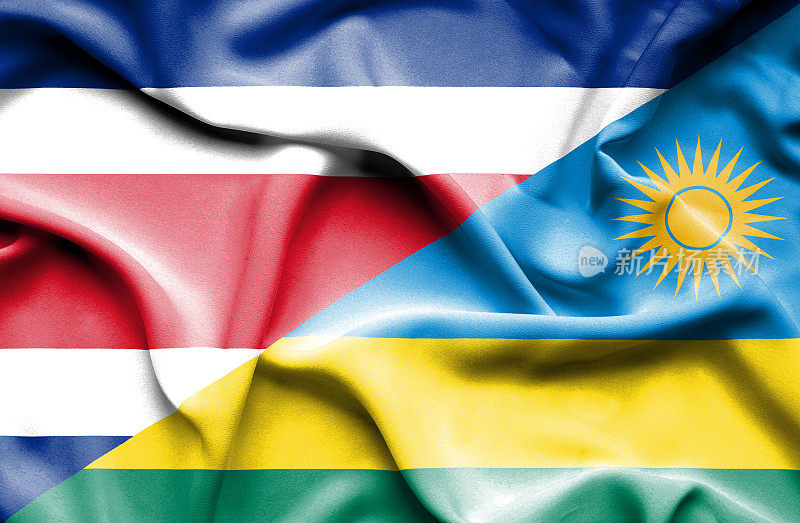 挥舞着卢旺达和哥斯达黎加的旗帜