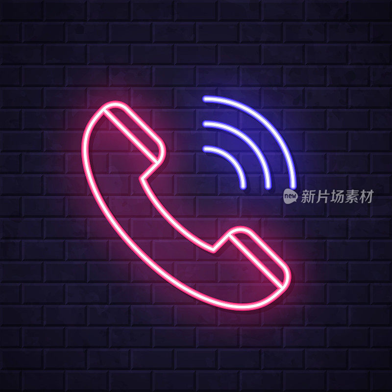电话。在砖墙背景上发光的霓虹灯图标
