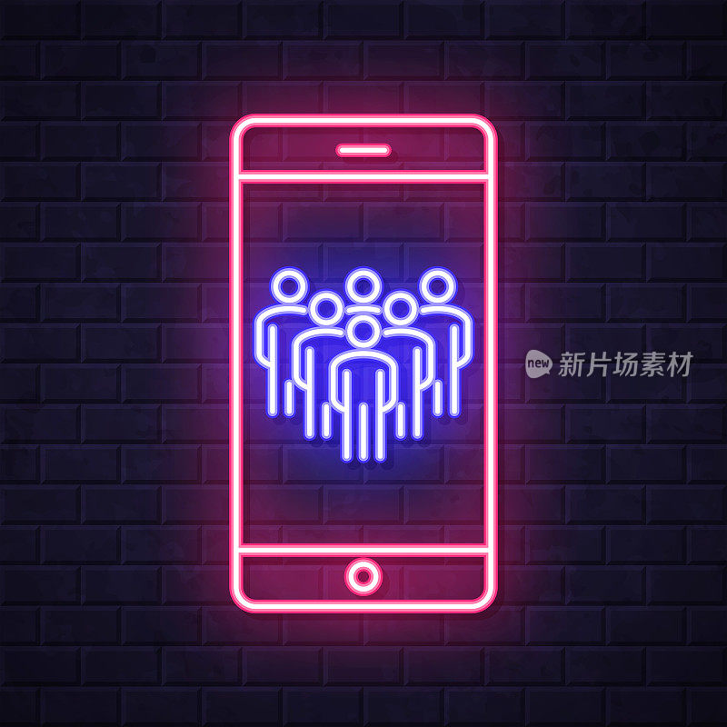 智能手机上的社交媒体。在砖墙背景上发光的霓虹灯图标