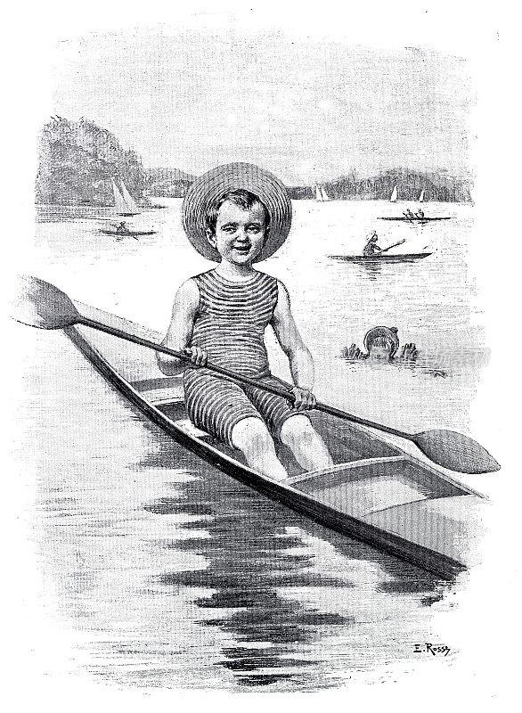 1897年，一个小男孩在湖面上划着独木舟
