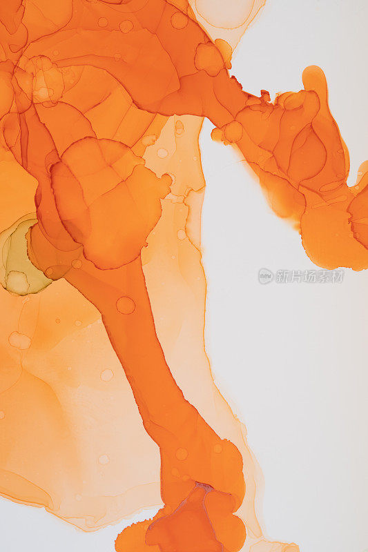 抽象橙色油墨背景。酒精墨水的艺术。