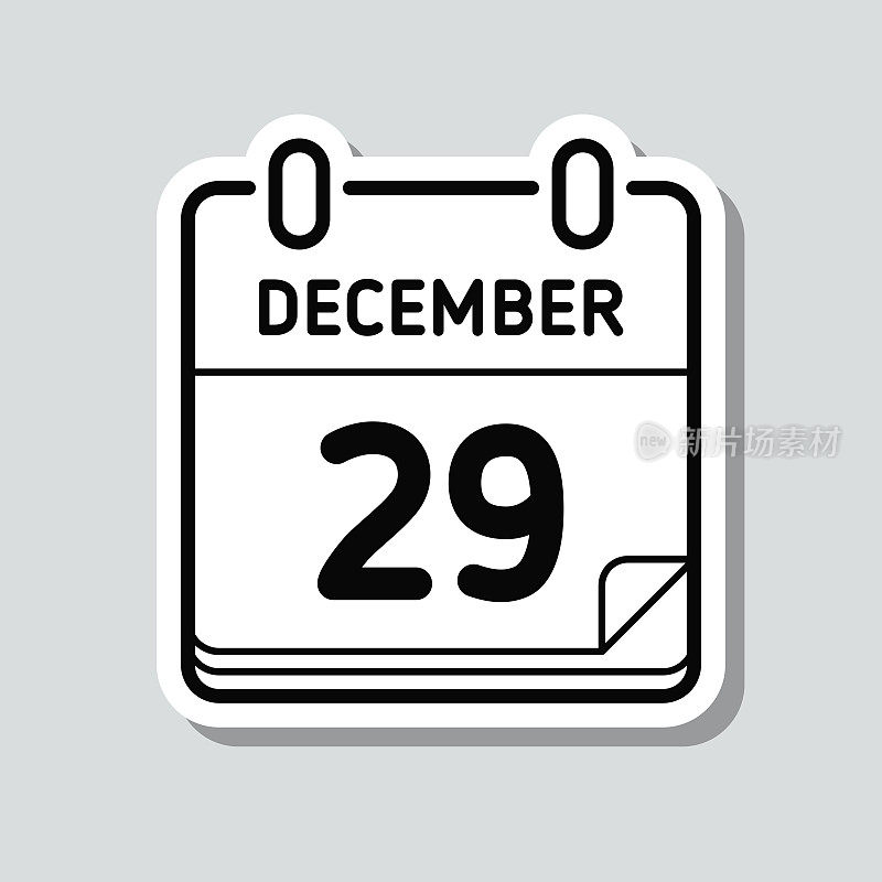 12月29日。灰色背景上的图标贴纸