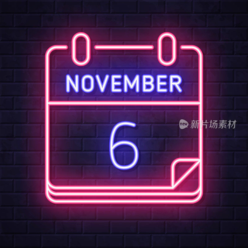 11月6日。在砖墙背景上发光的霓虹灯图标