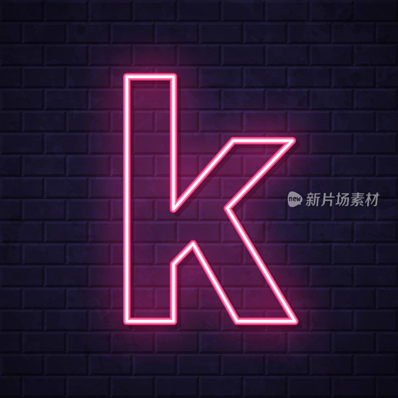 字母k。在砖墙背景上发光的霓虹灯图标