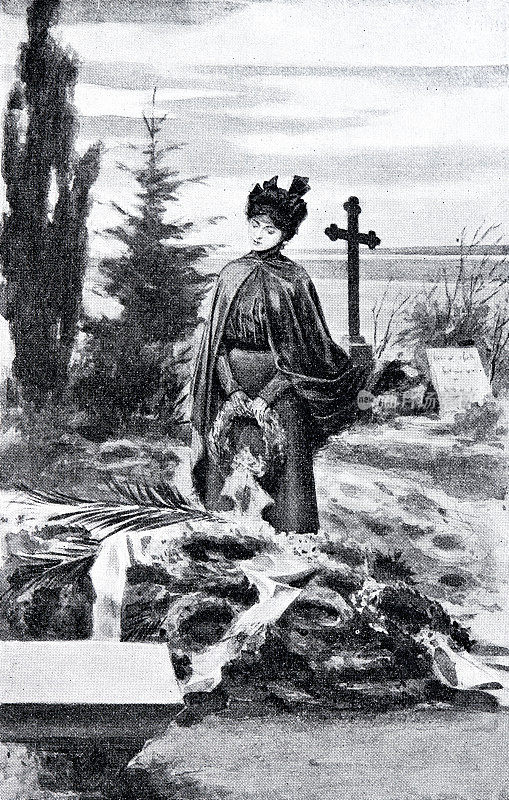 一个女人在新坟前哀悼