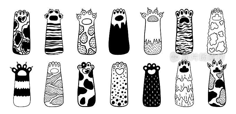 可爱的猫、狗爪子、宠物涂鸦画集。黑白相间有趣的小猫或可爱的熊动物，虎豹剪影的手，快乐简单的喵喵猫。矢量卡通套装
