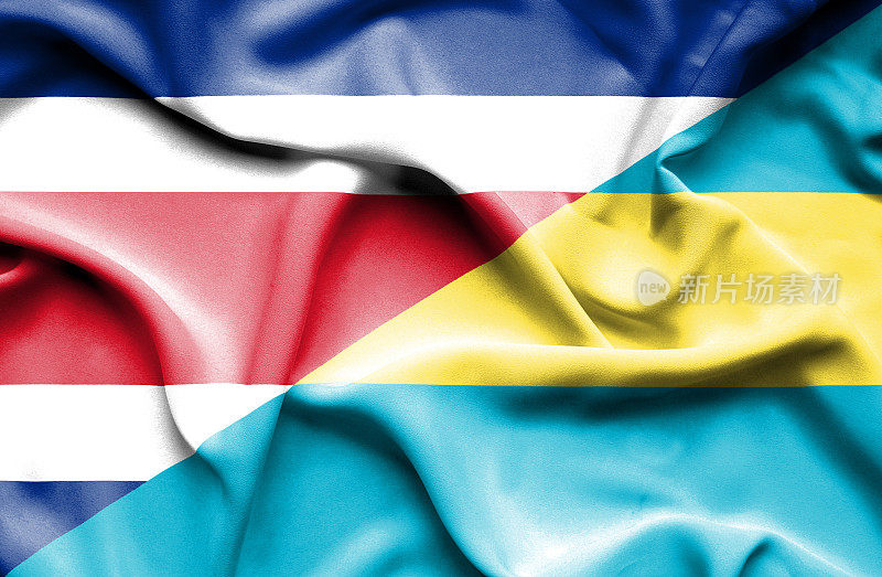 挥舞着巴哈马和哥斯达黎加的旗帜