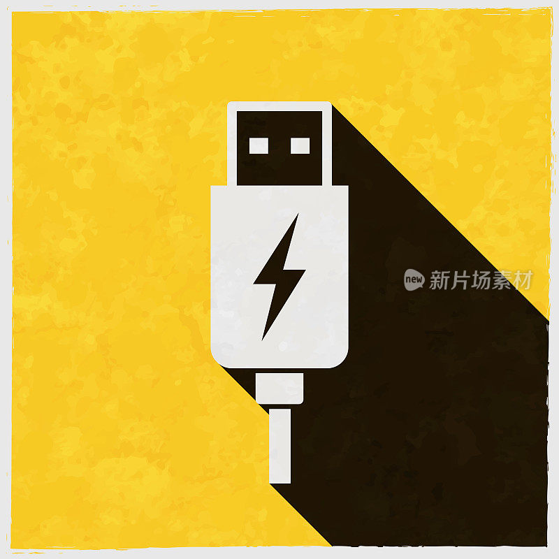 USB充电插头。图标与长阴影的纹理黄色背景
