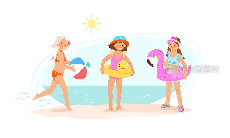 三个可爱的小女孩穿着鲜艳的泳衣在海边玩沙滩球，火烈鸟和鸭子的充气圆圈。