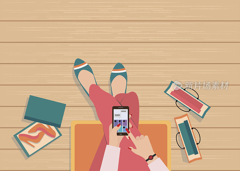 网上购物概念与女性使用智能手机俯视图