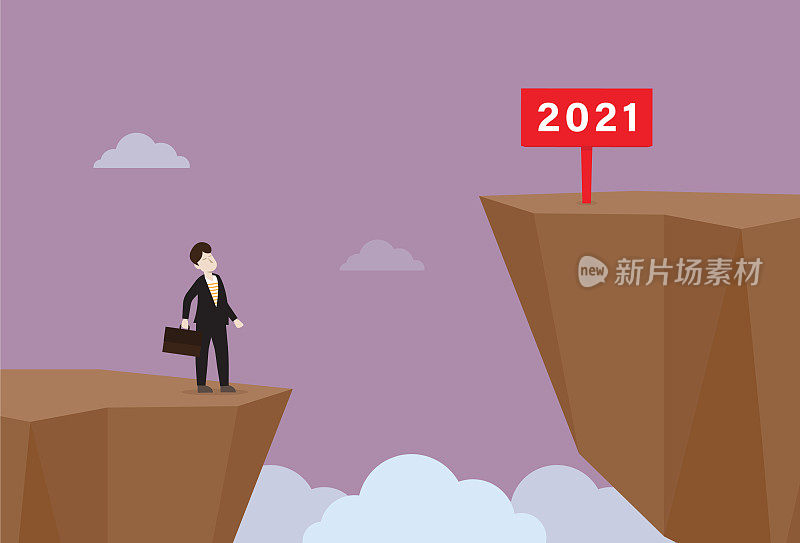 一名商人看着更高悬崖上的2021标志