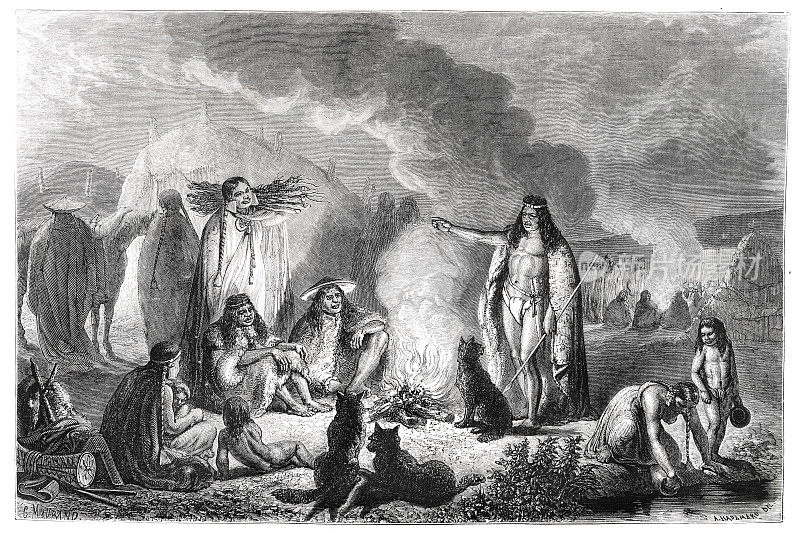 巴塔哥尼亚营地壁炉旁的一群巴塔哥尼人