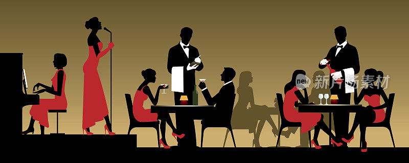 人们在夜总会或餐厅坐在桌子旁