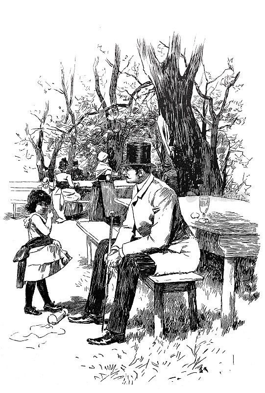 一个小女孩在公园里和一个戴帽子的男人说话