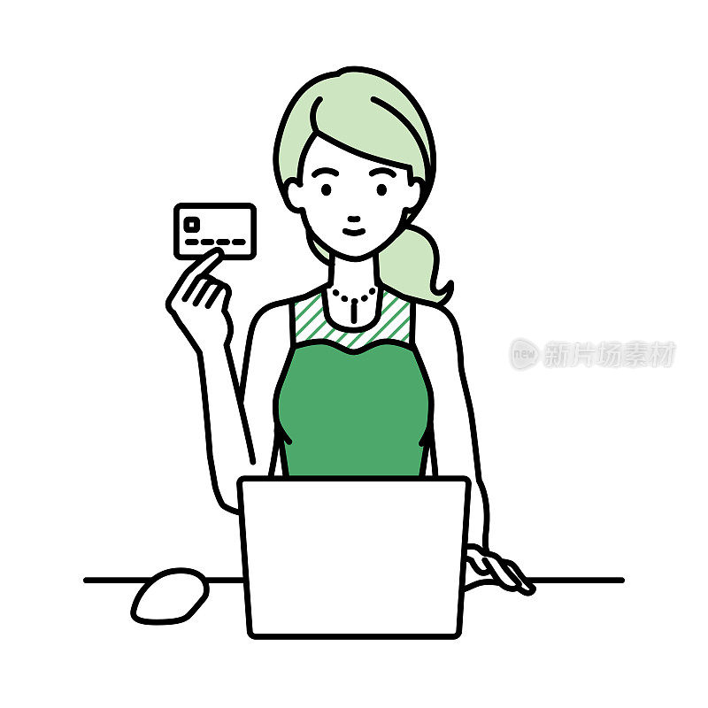一个穿着衣服的女人坐在桌子前用笔记本电脑，手里拿着一张信用卡