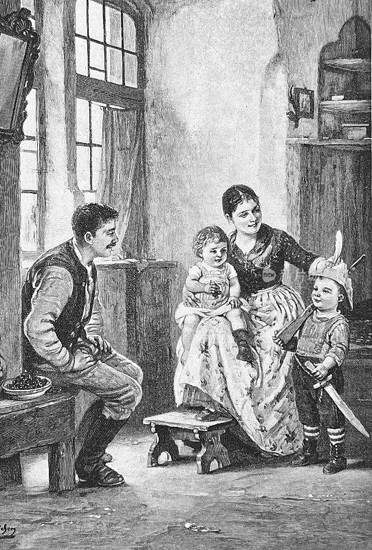 一家人带着两个孩子在客厅里玩，儿子装扮成中世纪的骑士