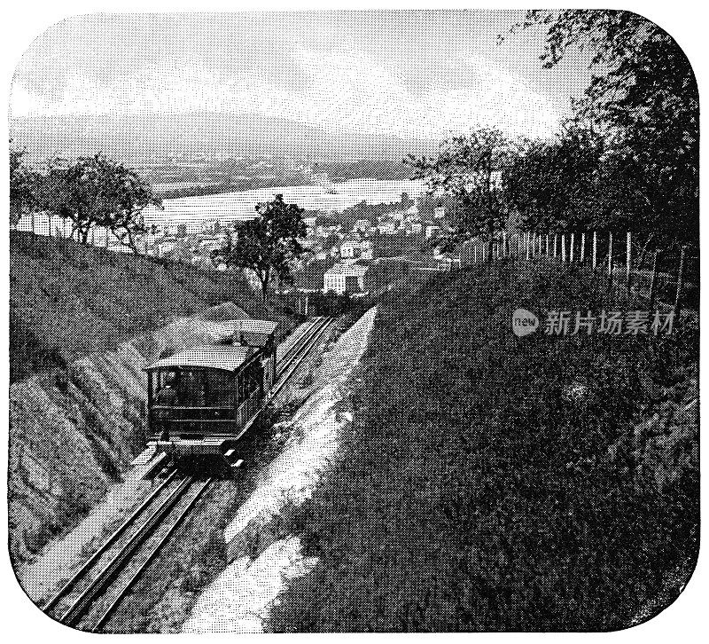 19世纪，德国北莱茵-威斯特伐利亚州德拉肯费尔斯山的德拉肯费尔斯铁路上的一辆原始蒸汽火车