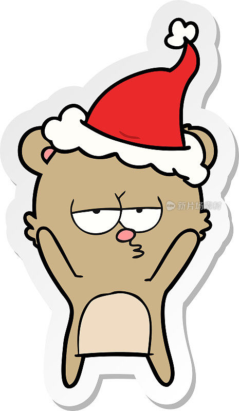 无聊的小熊手绘了一个戴着圣诞老人帽子的卡通贴纸