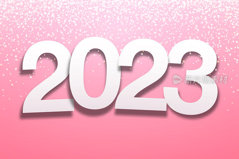 2023年的纸字体与金色闪光的粉红色背景