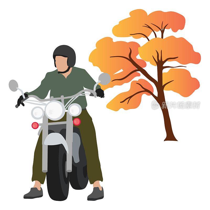 骑摩托车的人在秋天