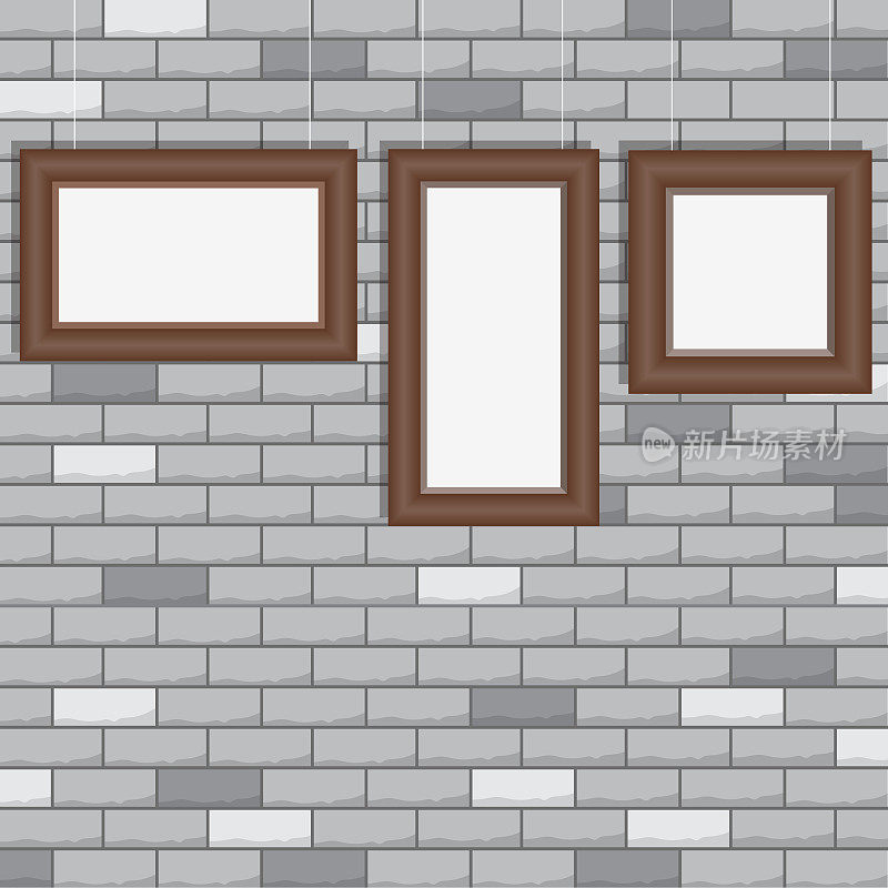 砖墙上的木框架。室内画廊，砖墙上有空框架。