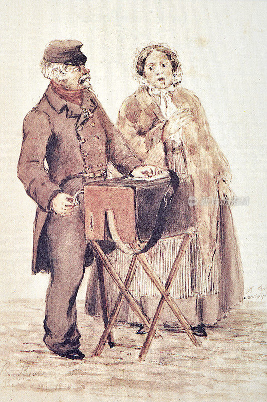 一个管风琴手和他的妻子在街上表演